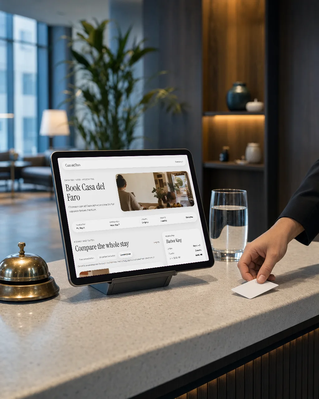 Estadia on a tablet on a hotel front desk: the property's booking engine